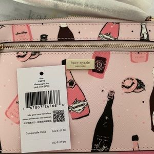 Kate Spade tinie wristlet champagne toss NWT